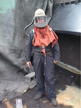 Figure 1. Blaster with personal protective equipment